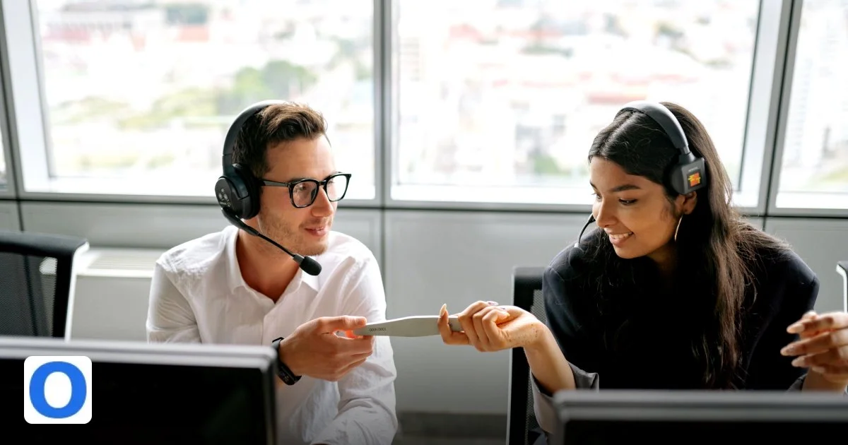 Facebook Messenger in 2026: Still Worth Investing In? - two call center agents sharing a document while communicating